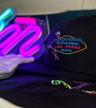 Load image into Gallery viewer, 🦩 Welcome to Scandalous Las Vegas hat - Curved or flat brim | Glows in the dark