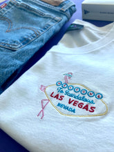 Load image into Gallery viewer, 🦩 WELCOME To Scandalous LAS VEGAS NEVADA... White T-Shirt - Man - Unisex | Glows in the dark